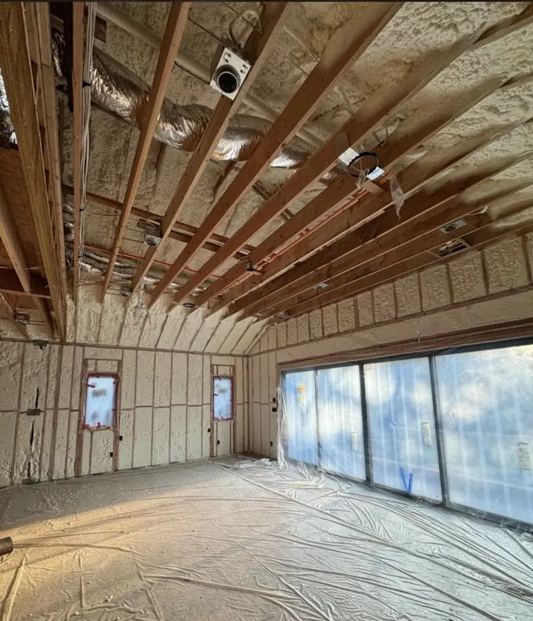 Interior walls and ceiling insulated with spray foam during new construction in Manheim